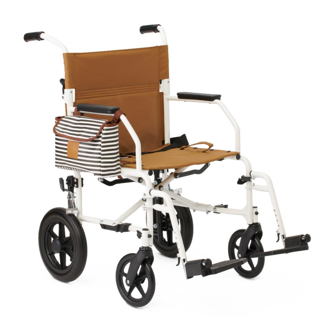 The Medline Designer High-Performance Transport Chair features a durable steel frame, tan seat and backrest, black armrests and footrests, a striped black-and-white side bag, plus large rear wheels for smooth mobility. Lightweight and foldable design.